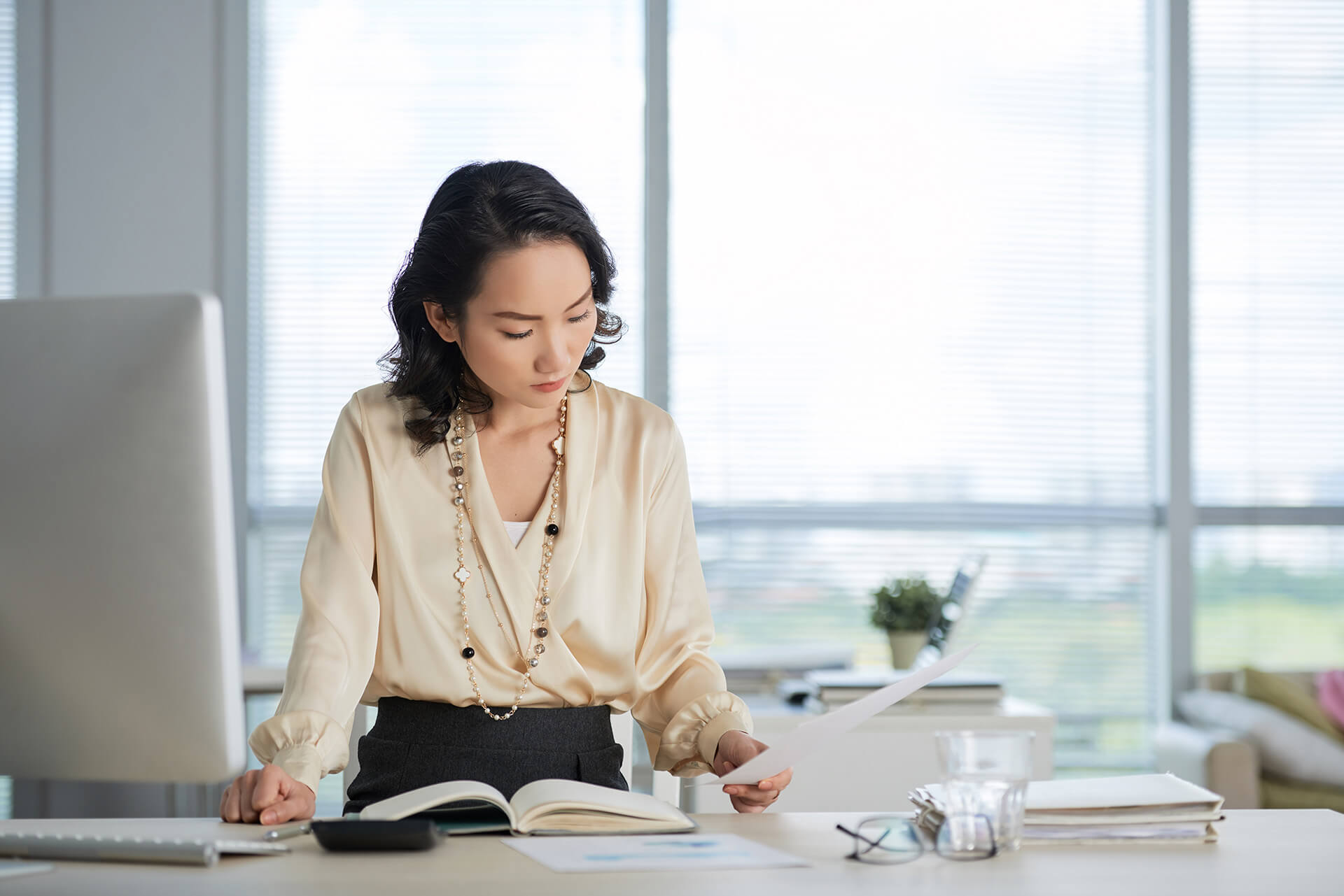 business-woman-working-with-papers-2021-08-26-19-52-48-utc.jpg